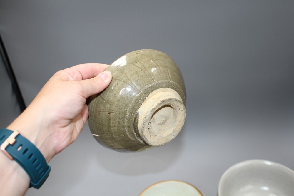Eight Chinese qingbai type and celadon bowls, Song-Ming dynasties